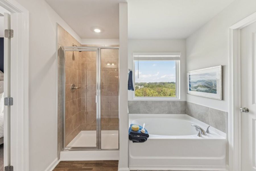 Furnished interior in a model home at The Hills at Cedar Creek in Winder (Image 75).