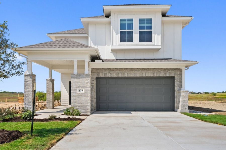 Front exterior of a home in the Saddle Ridge at Wildhorse Ranch community, located in Austin, TX (Image 3).