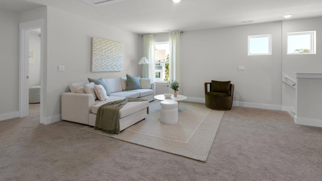 Furnished interior in a model home at Surfside Landing in Hubert (Image 20).