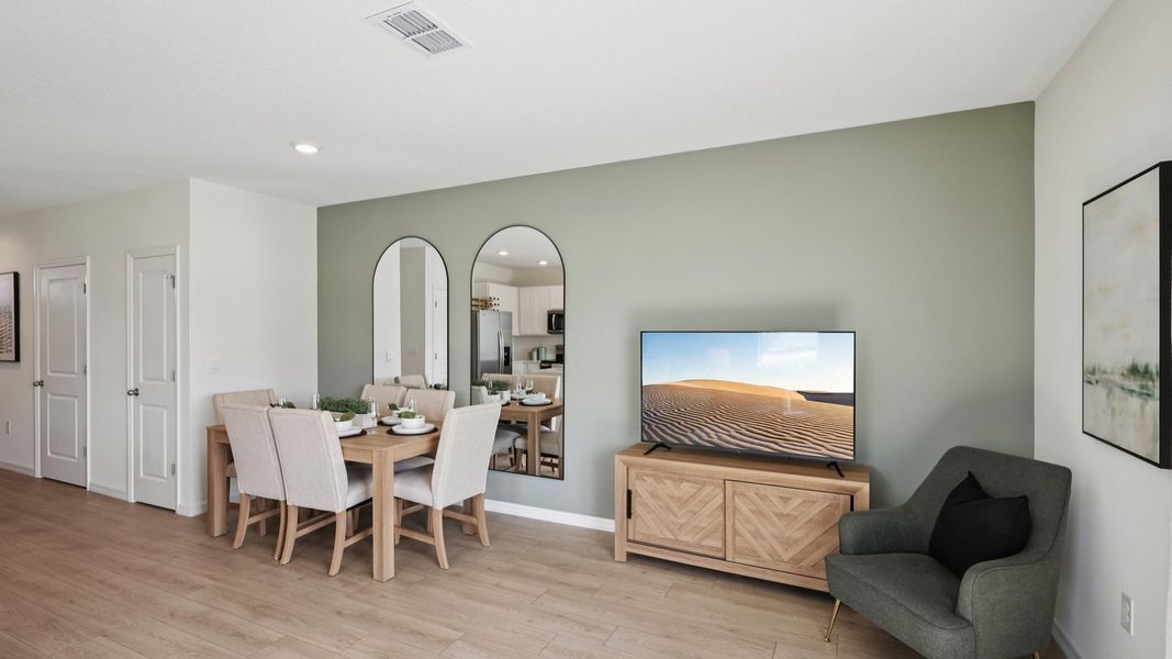 Furnished interior in a model home at Towns at Woodsdale in Wesley Chapel (Image 15).