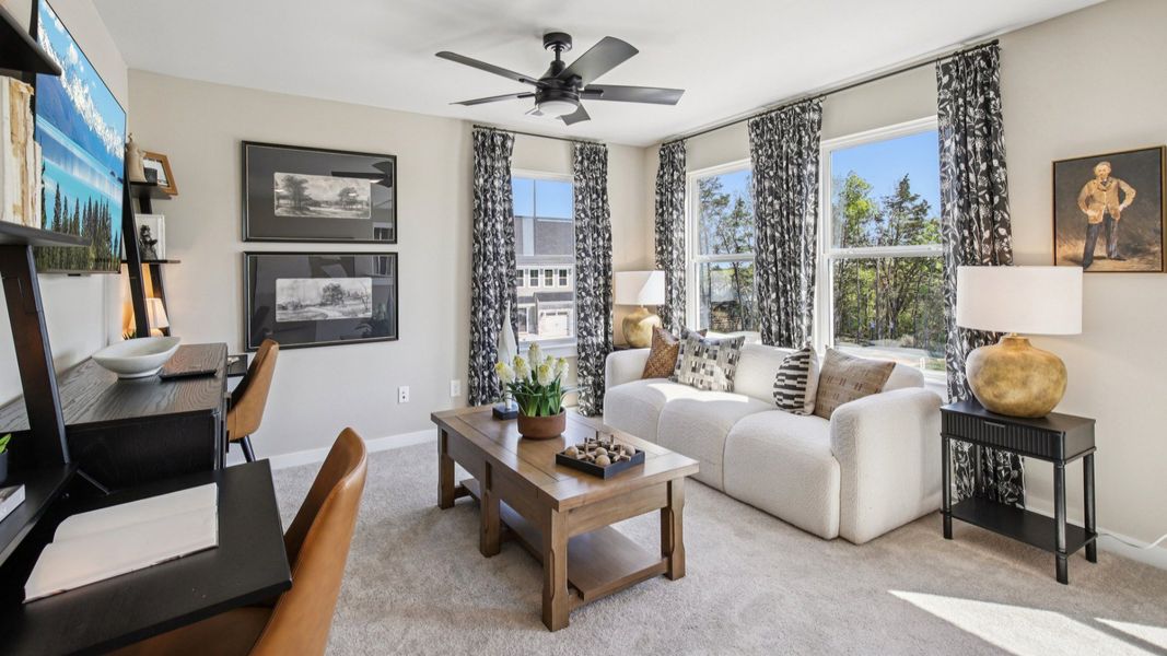 Cozy loft area giving you additional gathering and relaxing spaces around the home.