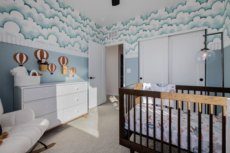 Furnished interior in a model home at Painted Prairie in Aurora (Image 64).