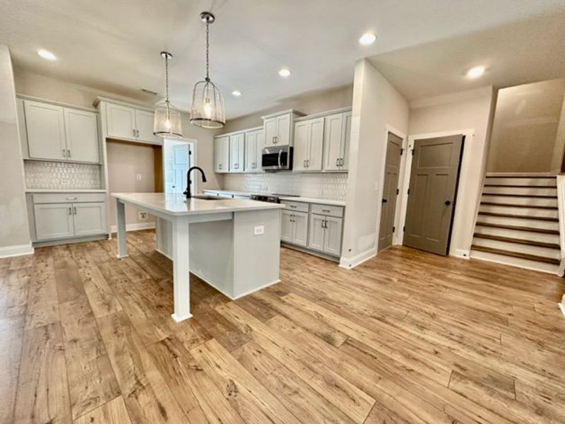 Furnished interior in a model home at Triple Park in Moreland (Image 5).