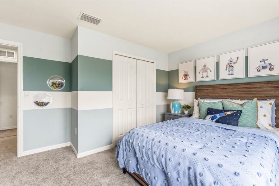 Furnished interior in a model home at Citrus Ridge in Lake Wales (Image 26).