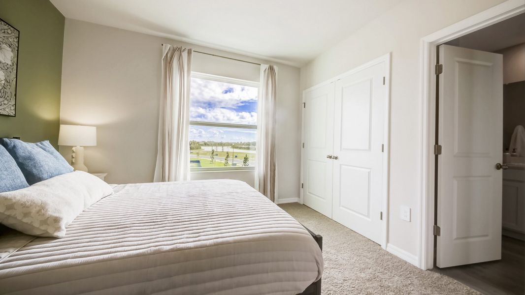 Furnished interior in a model home at The Gardens at Bay Street in Sarasota (Image 23).