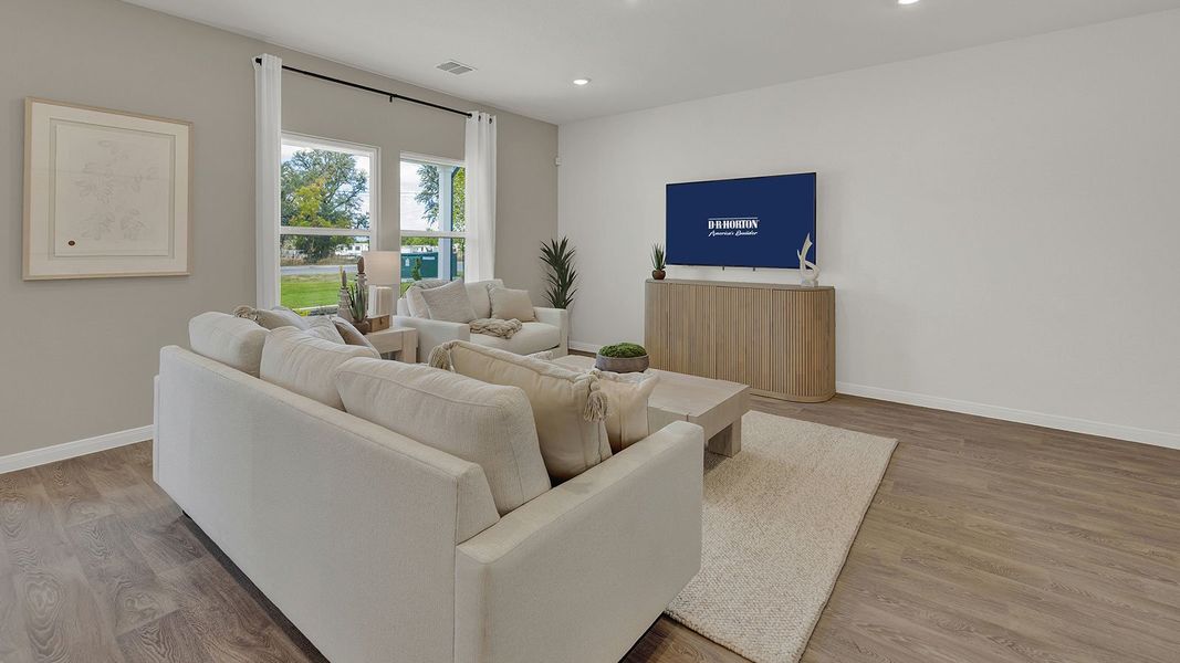 Furnished interior in a model home at Paramount in Kyle (Image 13).