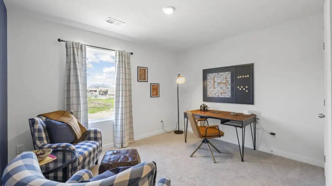 Furnished interior in a model home at Holloway Farms in Cleveland (Image 20).