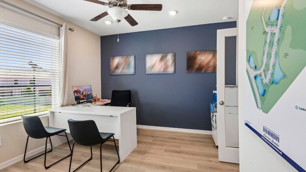 Furnished interior in a model home at Sanctuary at Citrus Park Townhomes in Tampa (Image 26).