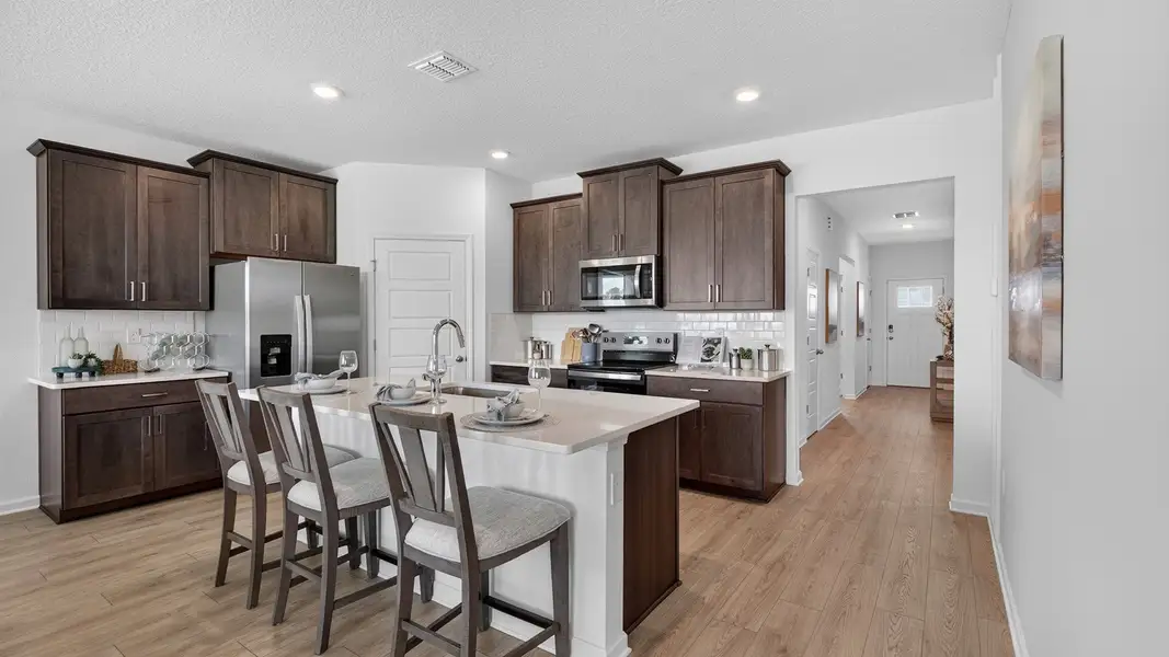 Furnished interior in a model home at Bridle Creek in Jacksonville (Image 4).