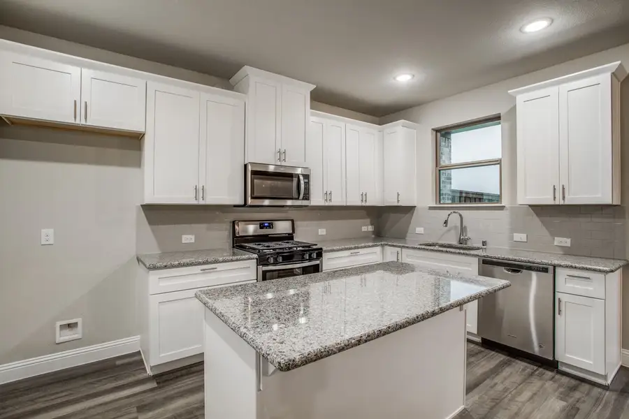 Image 2 of the Prairie Commons Townhomes community in Plano, TX.