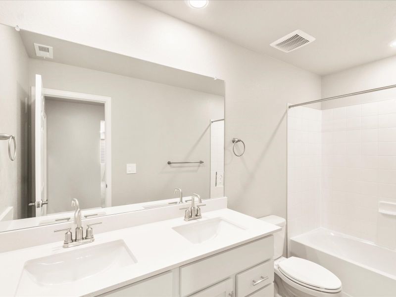 Furnished interior in a model home at Hidden Valley Farm in Severance (Image 5).