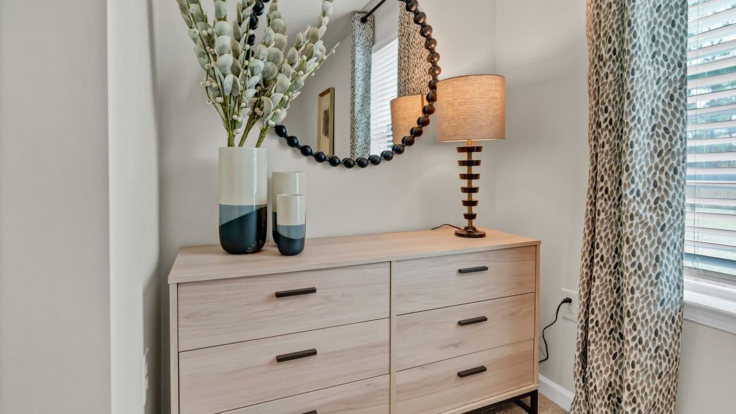 Furnished interior in a model home at South Haven in Camden (Image 20).