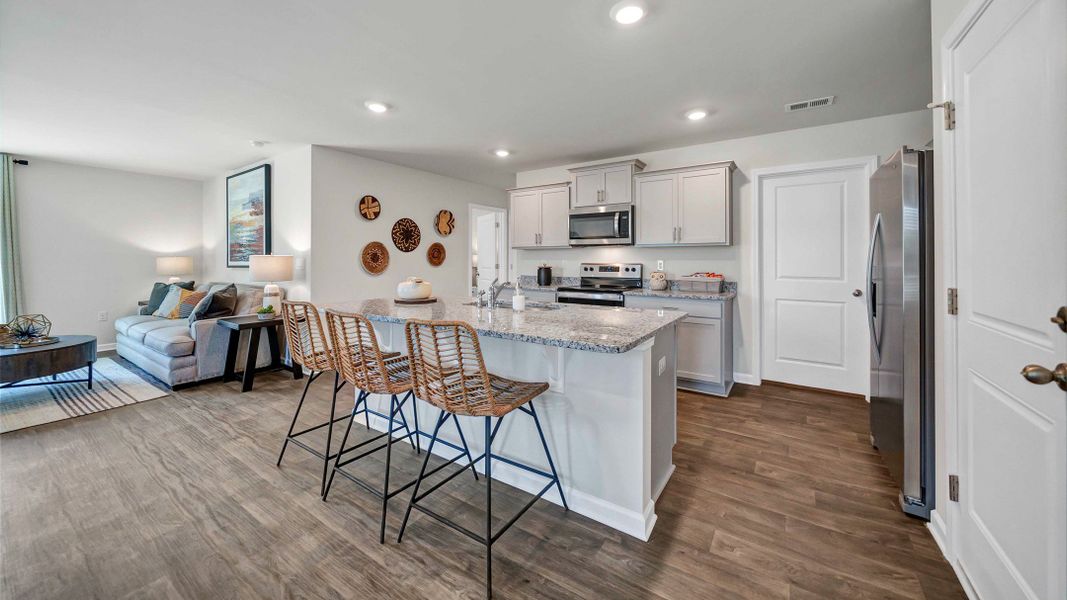 Furnished interior in a model home at South Haven in Camden (Image 7).