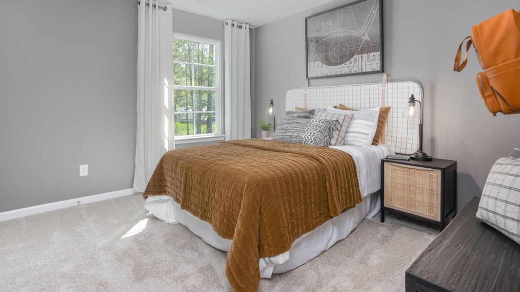 Furnished interior in a model home at River's Edge in Mayodan (Image 19).