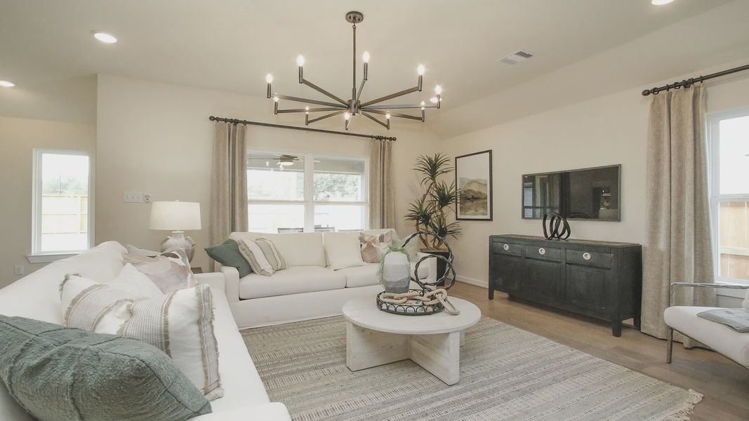 Experience elegance with a striking chandelier and chic furniture in Pinehurst's prestigious Colony community.