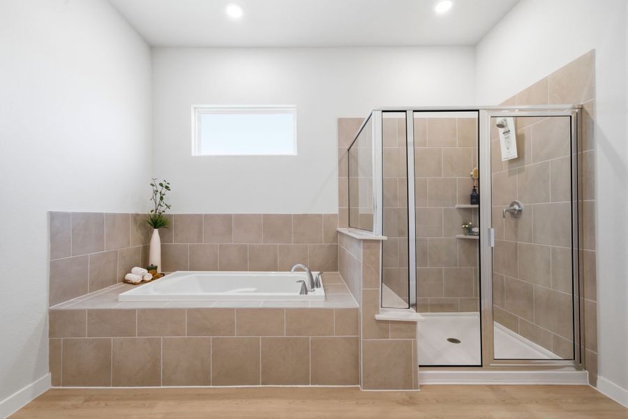 A bathroom with a glass shower.