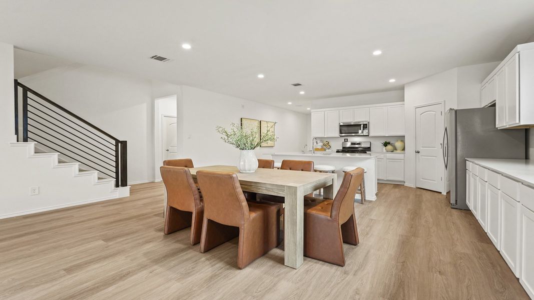 Furnished interior in a model home at Newport Pointe in Crosby (Image 18).
