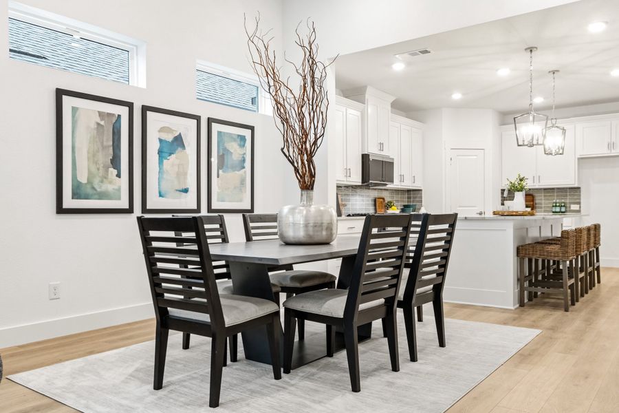 Furnished interior in a model home at Willow Grove Townhomes in Melissa (Image 12). Furnished interior in a model home at Willow Grove Townhomes in Melissa (Image 12).