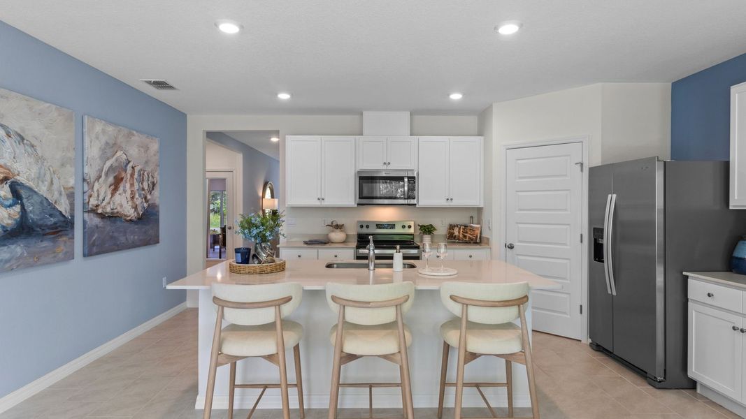 Furnished interior in a model home at Sun N Lake in Sebring (Image 7).