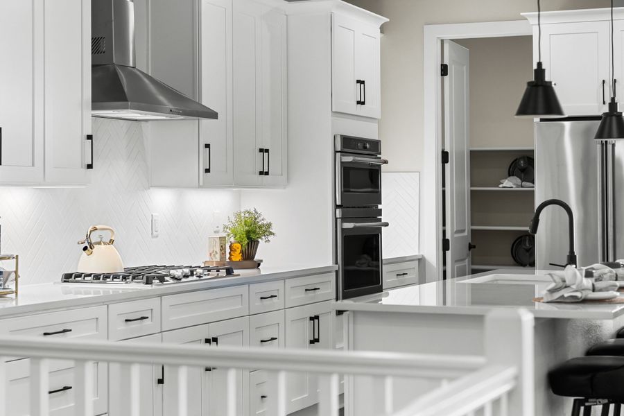 Furnished interior in a model home at Trumark Homes at Tanterra in Parker (Image 38).