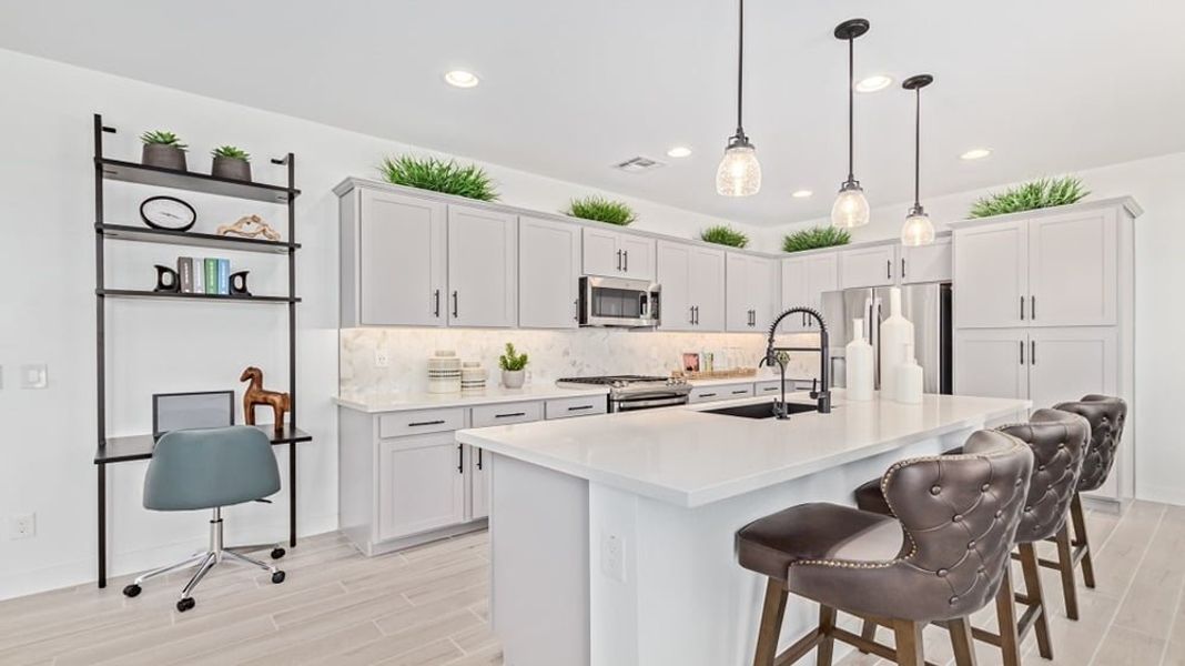 Furnished interior in a model home at Rio Vista at Rancho Mercado in Surprise (Image 5).