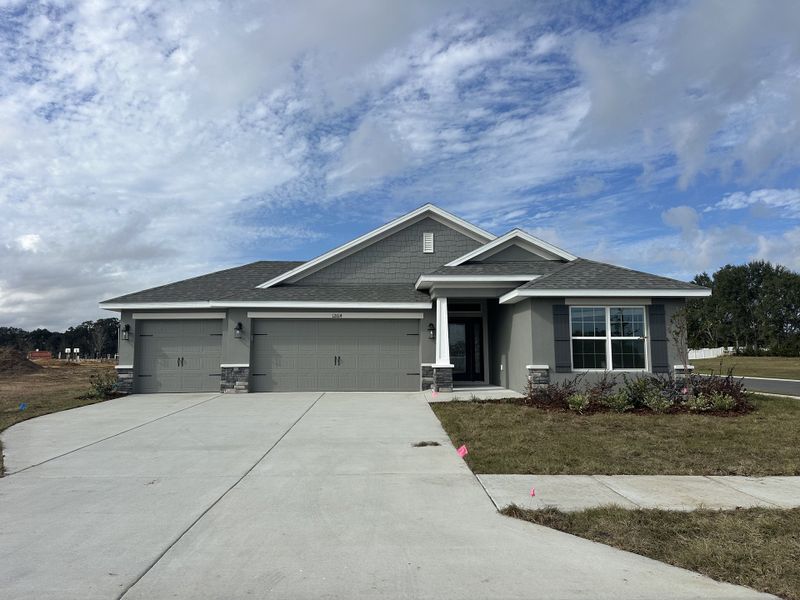 Front exterior of a home in the Densan Park community, located in Oxford, FL (Image 4).