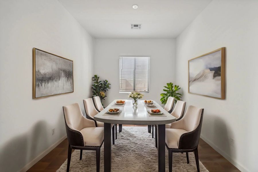 Furnished interior in a model home at Stonebridge Manor in Waddell (Image 6).