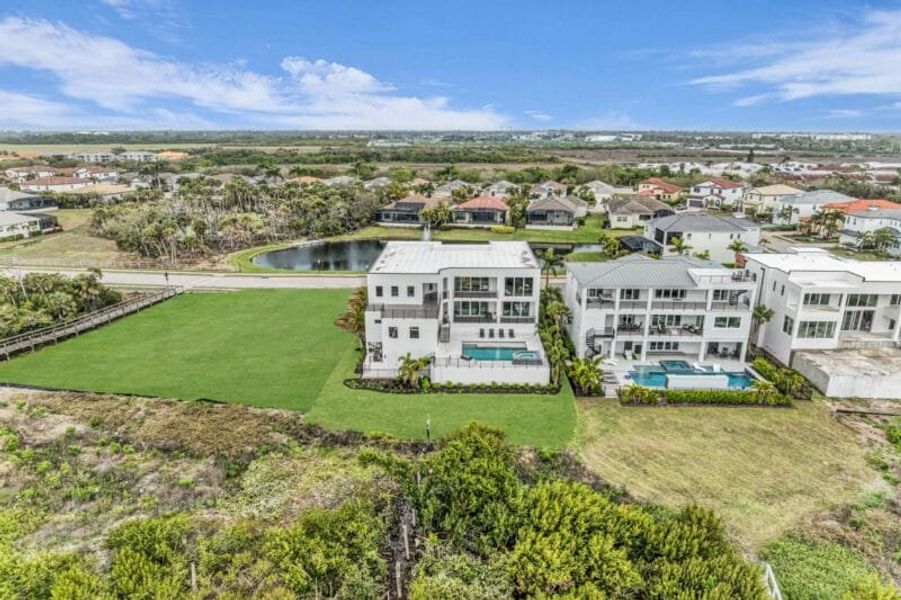 Aerial view of the Legends Bay community in Bradenton, FL, showing layout and nearby surroundings (Image 14). Aerial view of the Legends Bay community in Bradenton, FL, showing layout and nearby surroundings (Image 14).