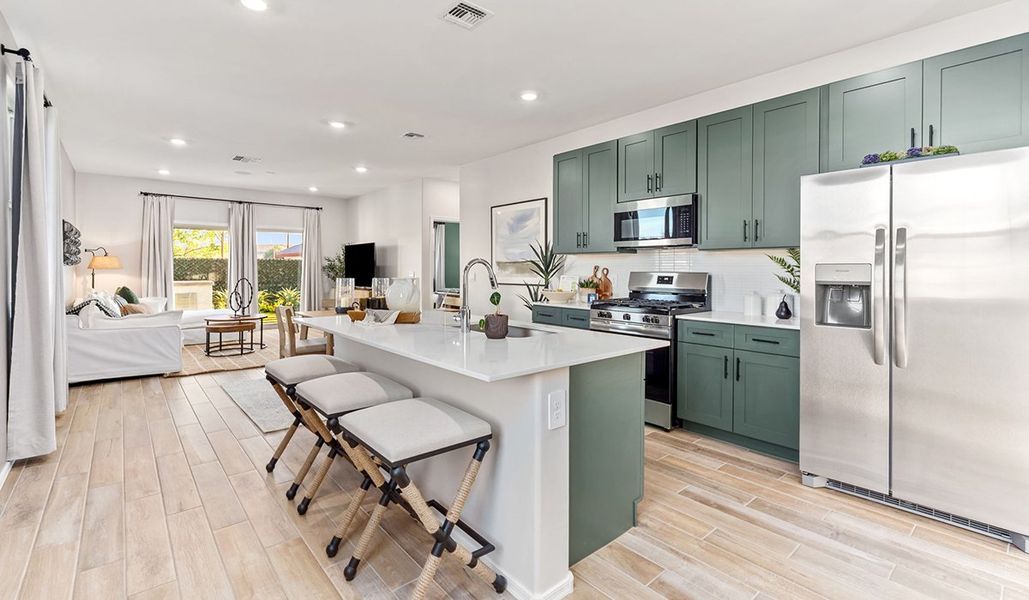 Furnished interior in a model home at Solterra in Green Valley (Image 1).