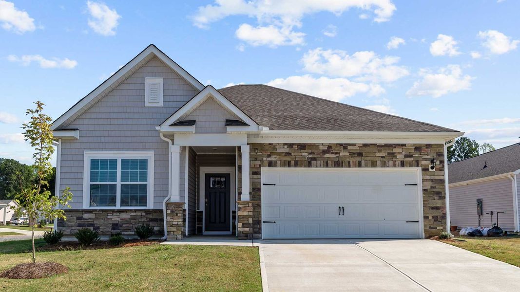 Front exterior of a home in the Bedford Place community, located in Wilson, NC (Image 16).