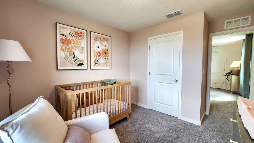 Furnished interior in a model home at Vineland Reserve in Osteen (Image 9).