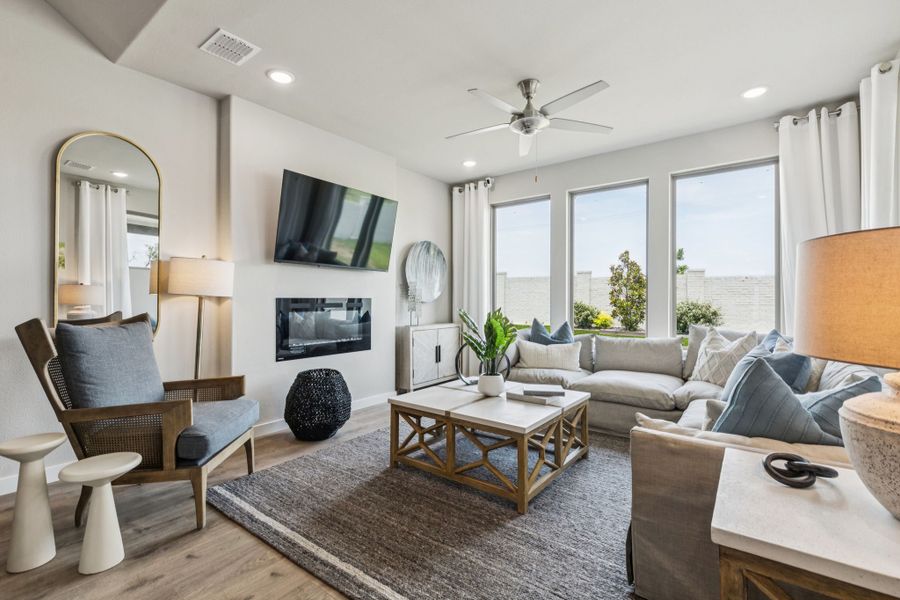 REPRESENTATIVE PHOTO – Living Room in a Lakehaven Wimbledon model home in Farmersville TX by Trophy Signature Homes