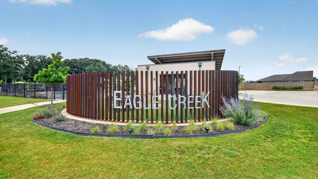 Entrance to the Eagle Creek community in Denton, TX, featuring signage and landscaping (Image 2). Entrance to the Eagle Creek community in Denton, TX, featuring signage and landscaping (Image 2).