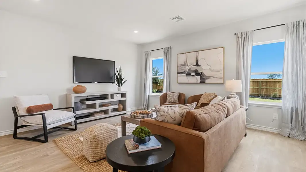 Furnished interior in a model home at Saddle Ridge Estates in Lytle (Image 6).