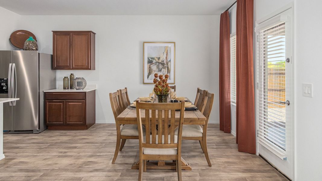 Furnished interior in a model home at Roadrunner Estates in Tucson (Image 13).