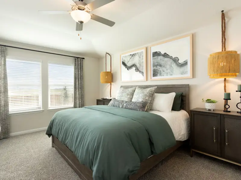 Live in luxury in the primary bedroom and bathroom.