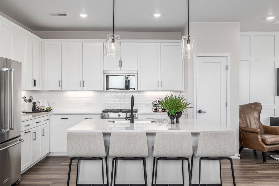 Furnished interior in a model home at Painted Prairie in Aurora (Image 9).