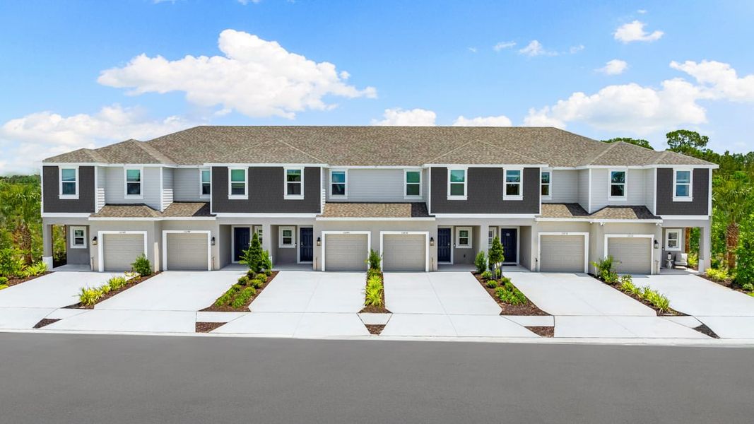 Front exterior of a home in the The Towns at Skye Ranch community, located in Sarasota, FL (Image 4).