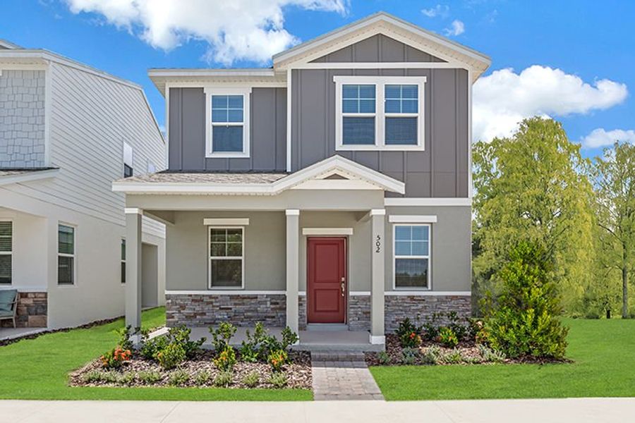 Front exterior of a home in the Spring Walk at the Junction community, located in Debary, FL (Image 2).