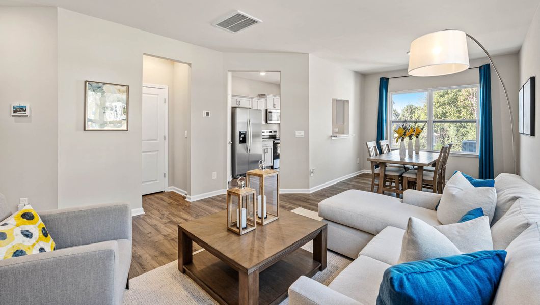 Furnished interior in a model home at Covington Village in Greer (Image 4).