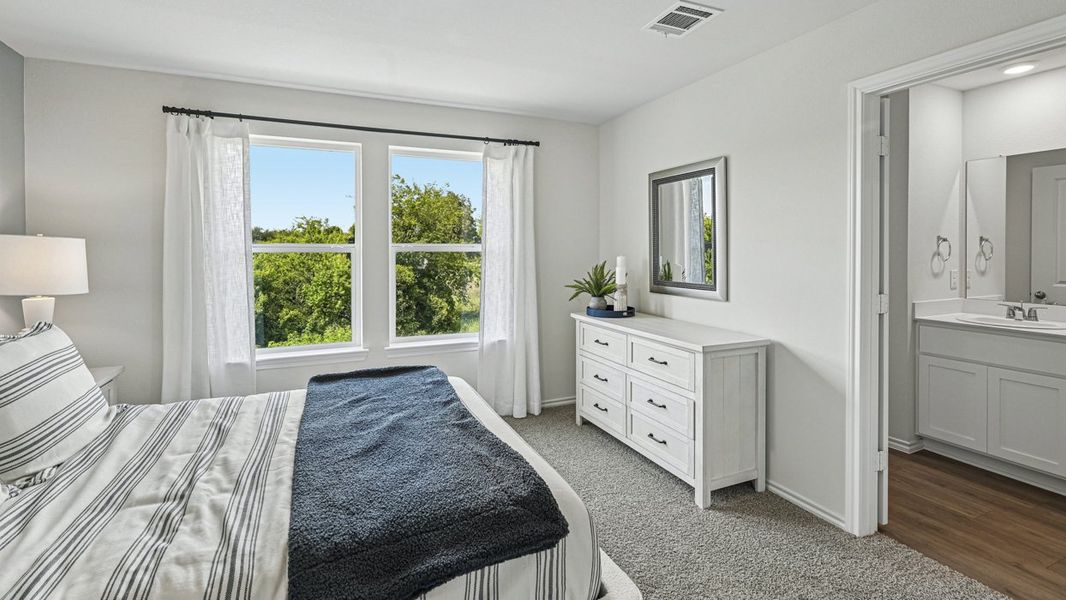 Furnished interior in a model home at Stonewood in Sulphur Springs (Image 40).
