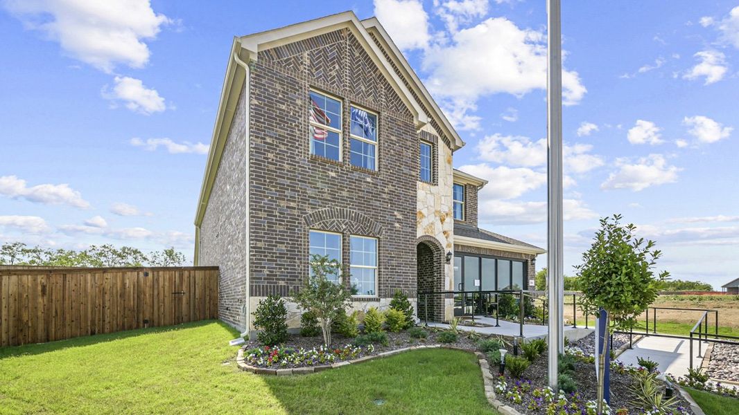 Front exterior of a home in the Lilybrooke at Legacy Hills community, located in Celina, TX (Image 11).