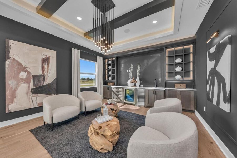 Furnished interior in a model home at Hampton Lakes in Sarasota (Image 170).