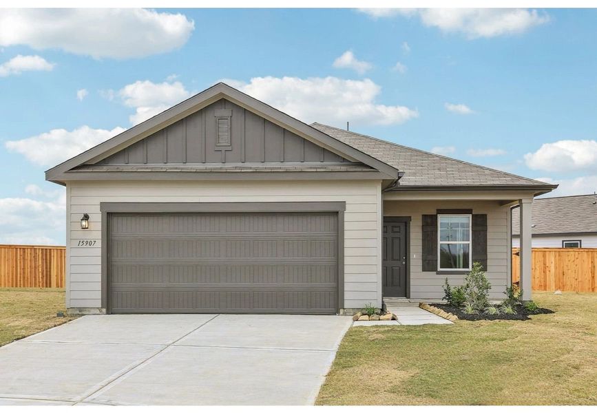 Front exterior of a home in the Spring Creek Trails community, located in Magnolia, TX (Image 3).