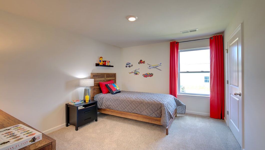 Furnished interior in a model home at Patton Cove in Clyde (Image 12).