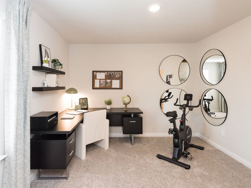 Furnished interior in a model home at Marshburn Landing - Bungalow Series in Wendell (Image 13).