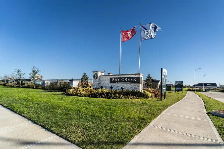 Entrance to the Bay Creek community in Baytown, TX, featuring signage and landscaping (Image 15).