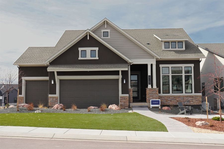 Front exterior of a home in the Cloverleaf – Mountainview Collection community, located in Monument, CO (Image 1).