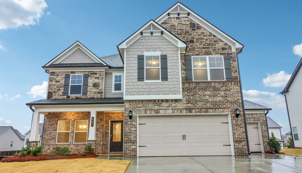 Front exterior of a home in the Pinecrest Ridge community, located in Dacula, GA (Image 12).