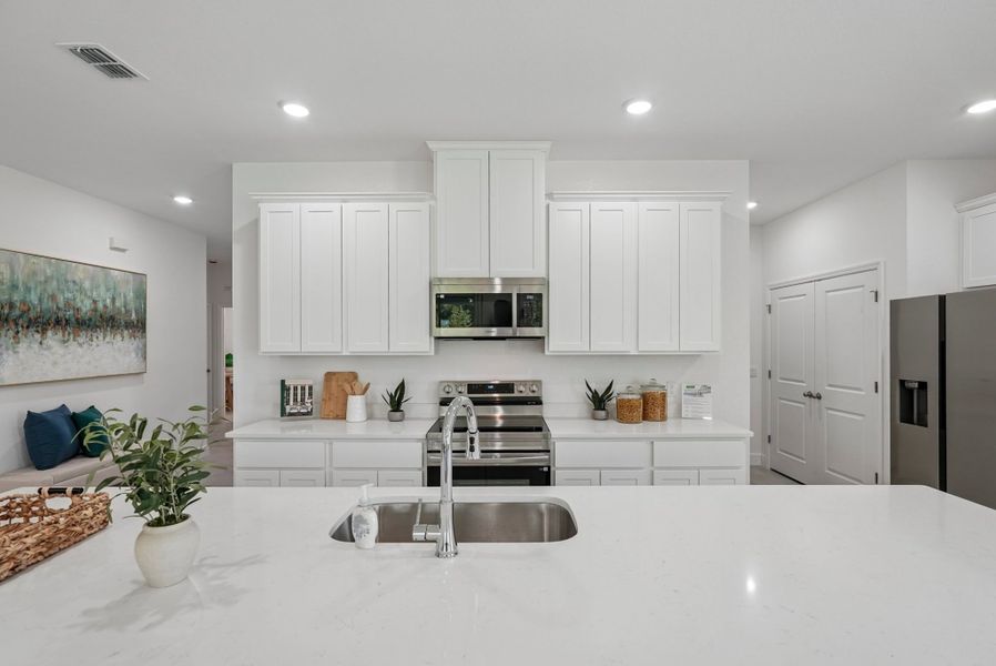 Furnished interior in a model home at Port Charlotte Signature in Port Charlotte (Image 4).